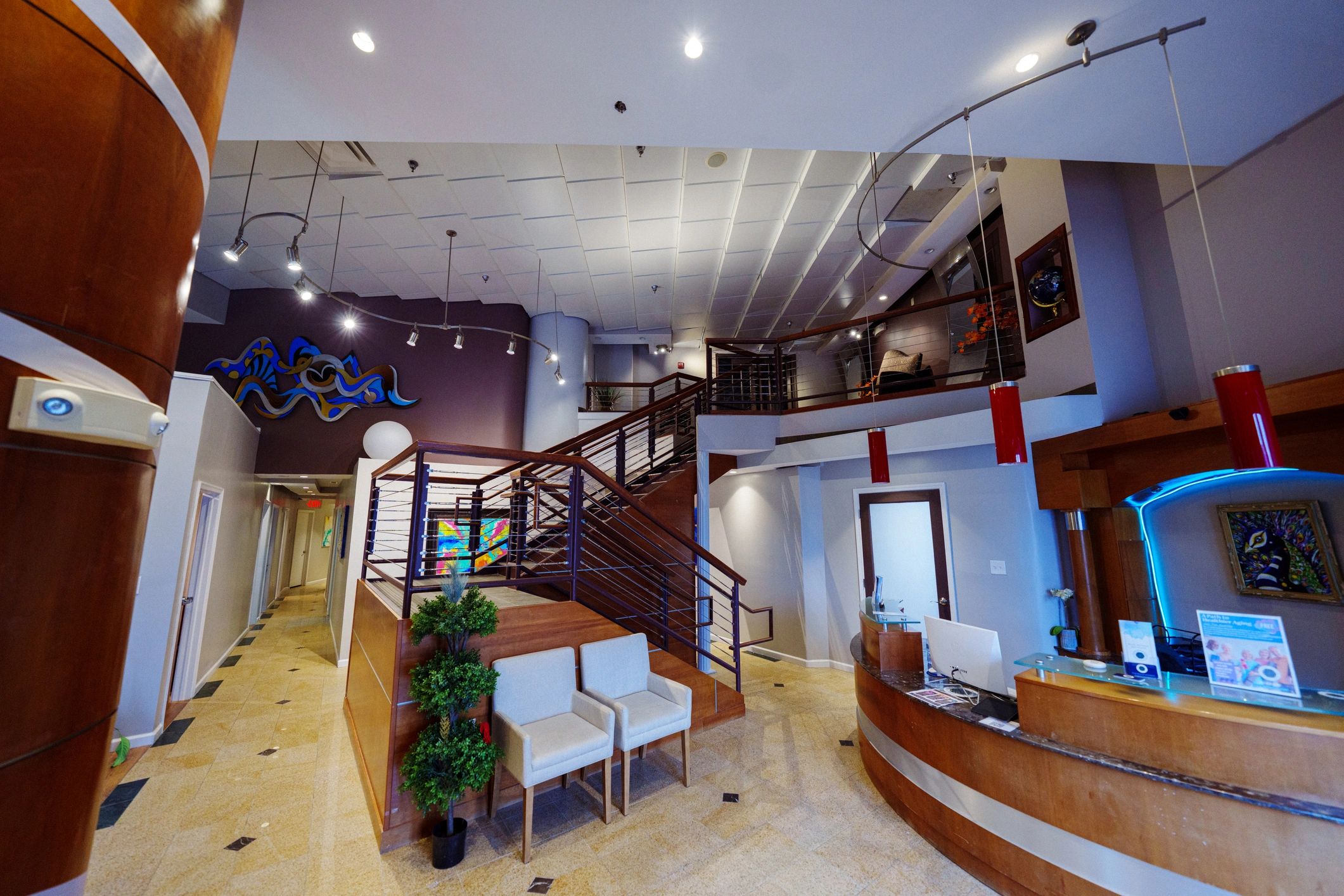 Spa reception area with front desk and seating